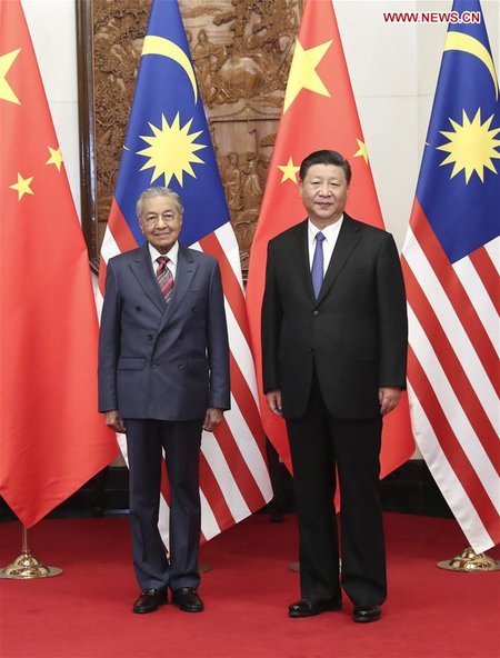 Xi Meets Malaysian PM in Beijing